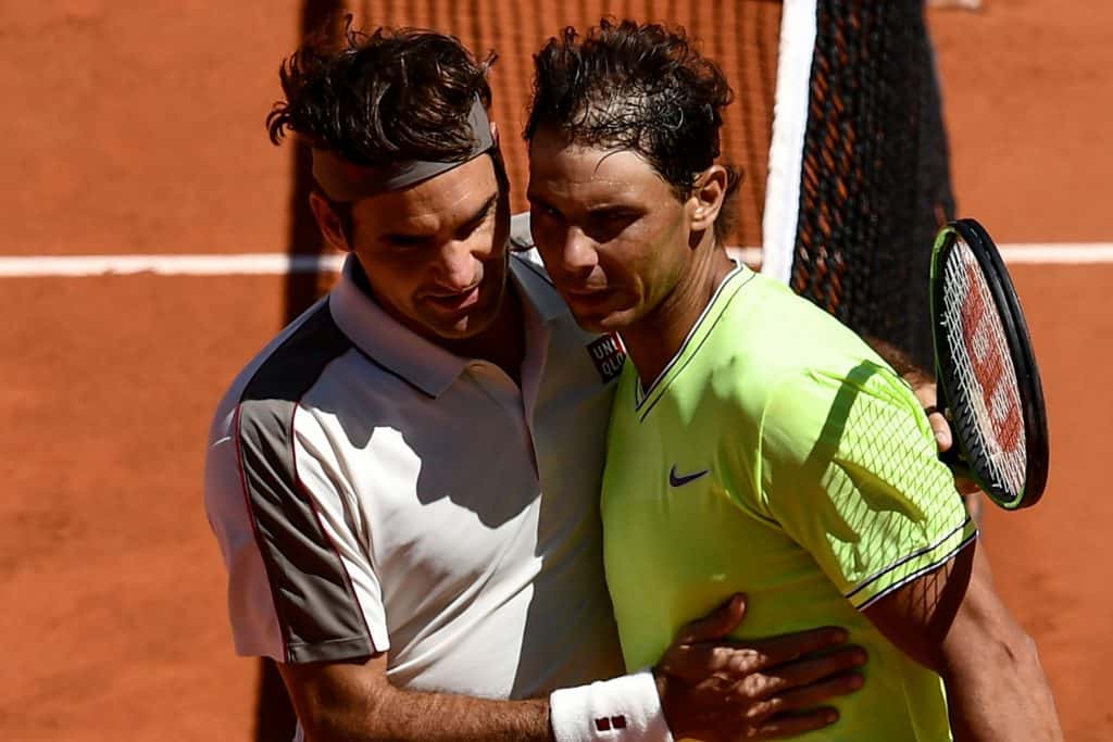 Nadal y Federer van por un triunfo que los ponga frente a frente en semis